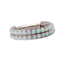 Double row opal clicker body jewelry in 16g by Body Clickers, featuring sparkling opal stones and a sleek silver design.