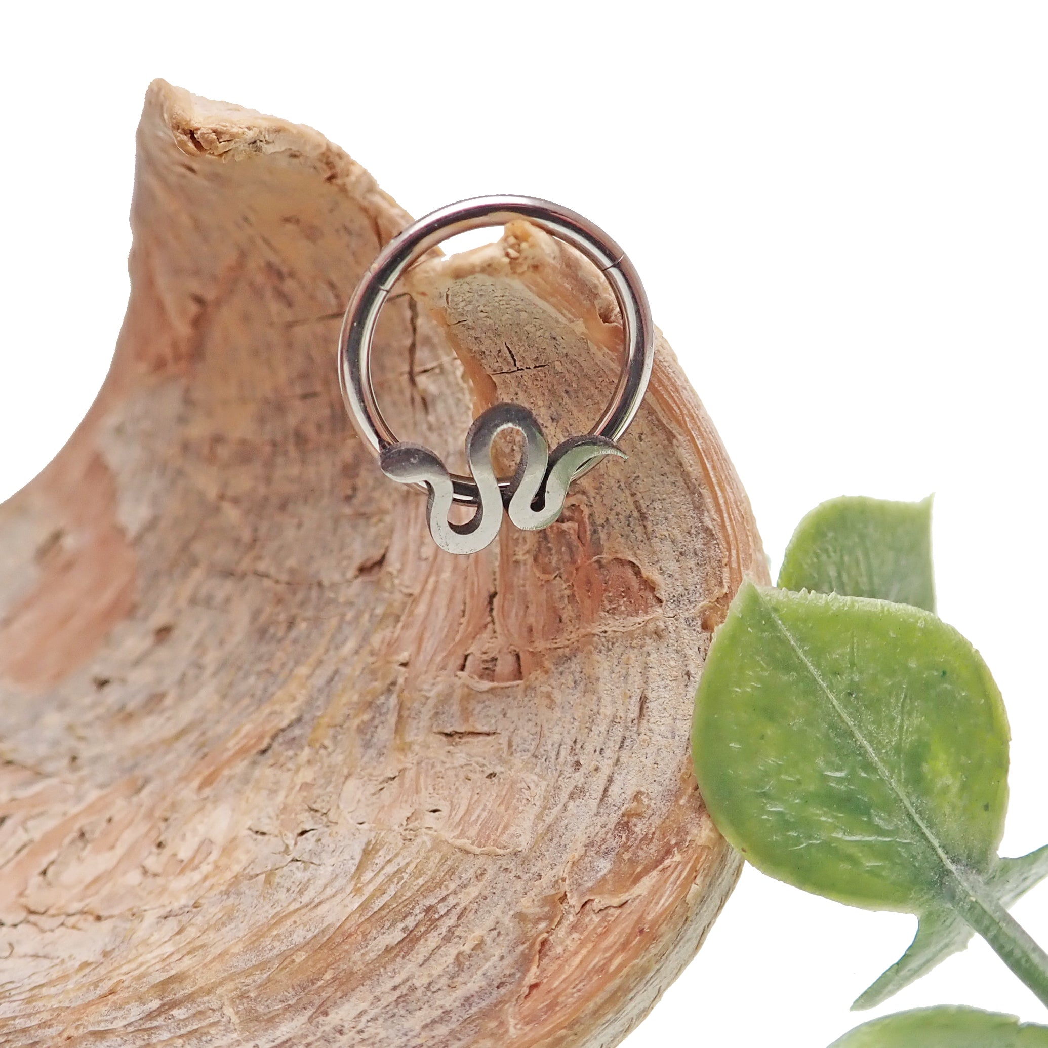 Flat Snake Clicker 16g body jewelry by Body Clickers, showcasing a sleek, curved snake design in silver-tone metal.