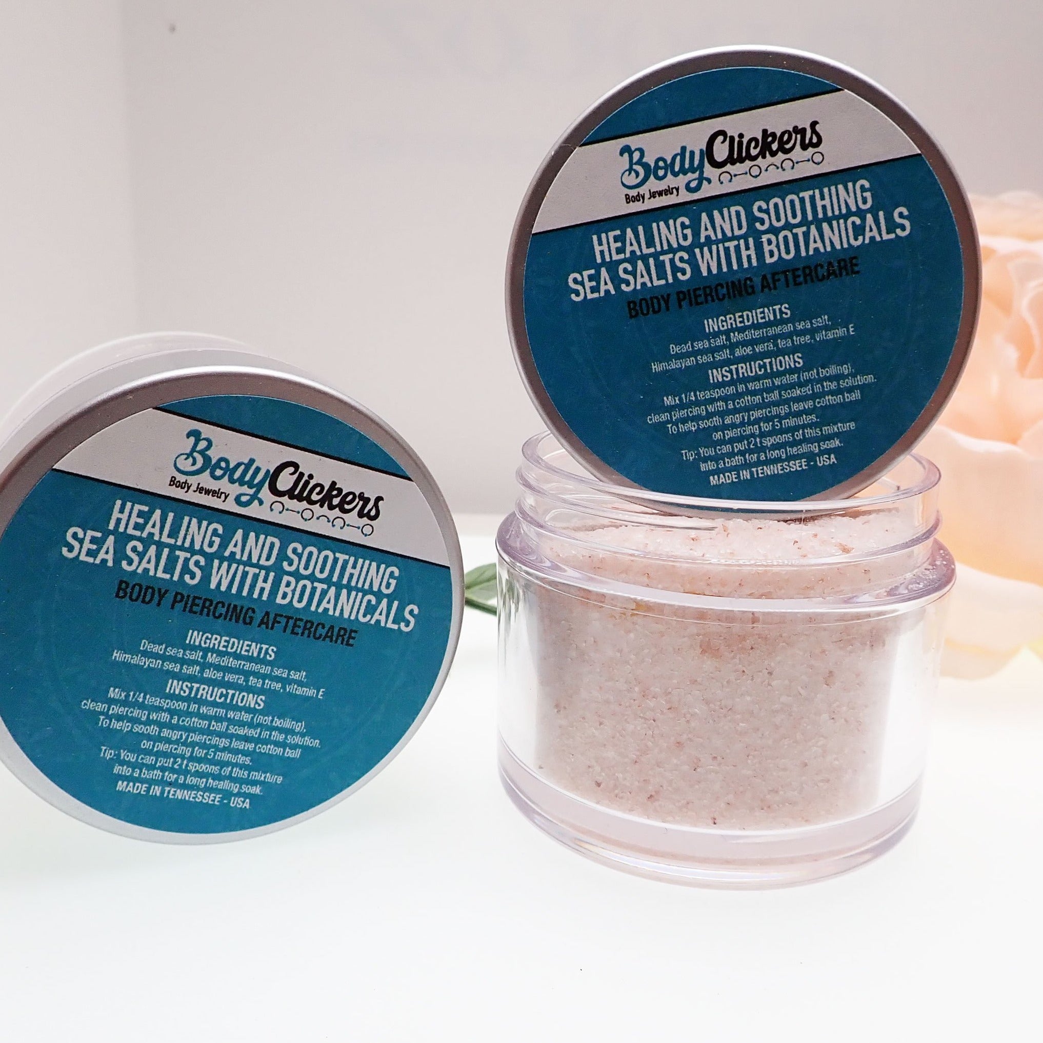 Healing Salt Body Piercing Aftercare by Body Clickers, featuring a container of salt solution for post-piercing healing.