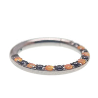 Orange and black CZ titanium clicker body jewelry in 16g, featuring a sleek design by Body Clickers.
