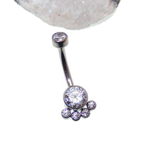 Paw print clear cubic zirconia belly button barbell body jewelry by Body Clickers, 14g with a decorative paw print design.