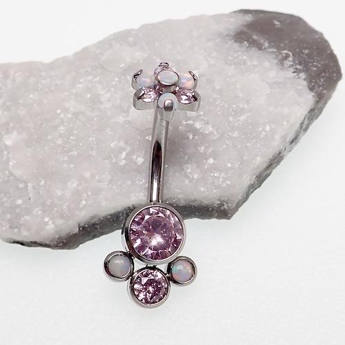 Rose Swarovski and opal flower belly ring in 14g body jewelry by Body Clickers, featuring a decorative floral design.