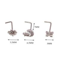 Set of 3 Body Clickers nose L-curves body jewelry featuring moon, star, starburst, and petal designs in 20g size.