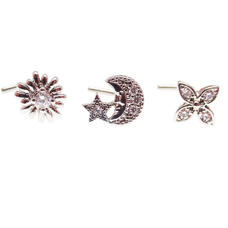 Set of 3 Body Clickers nose L-curves body jewelry featuring moon, star, starburst, and petal designs in 20g.