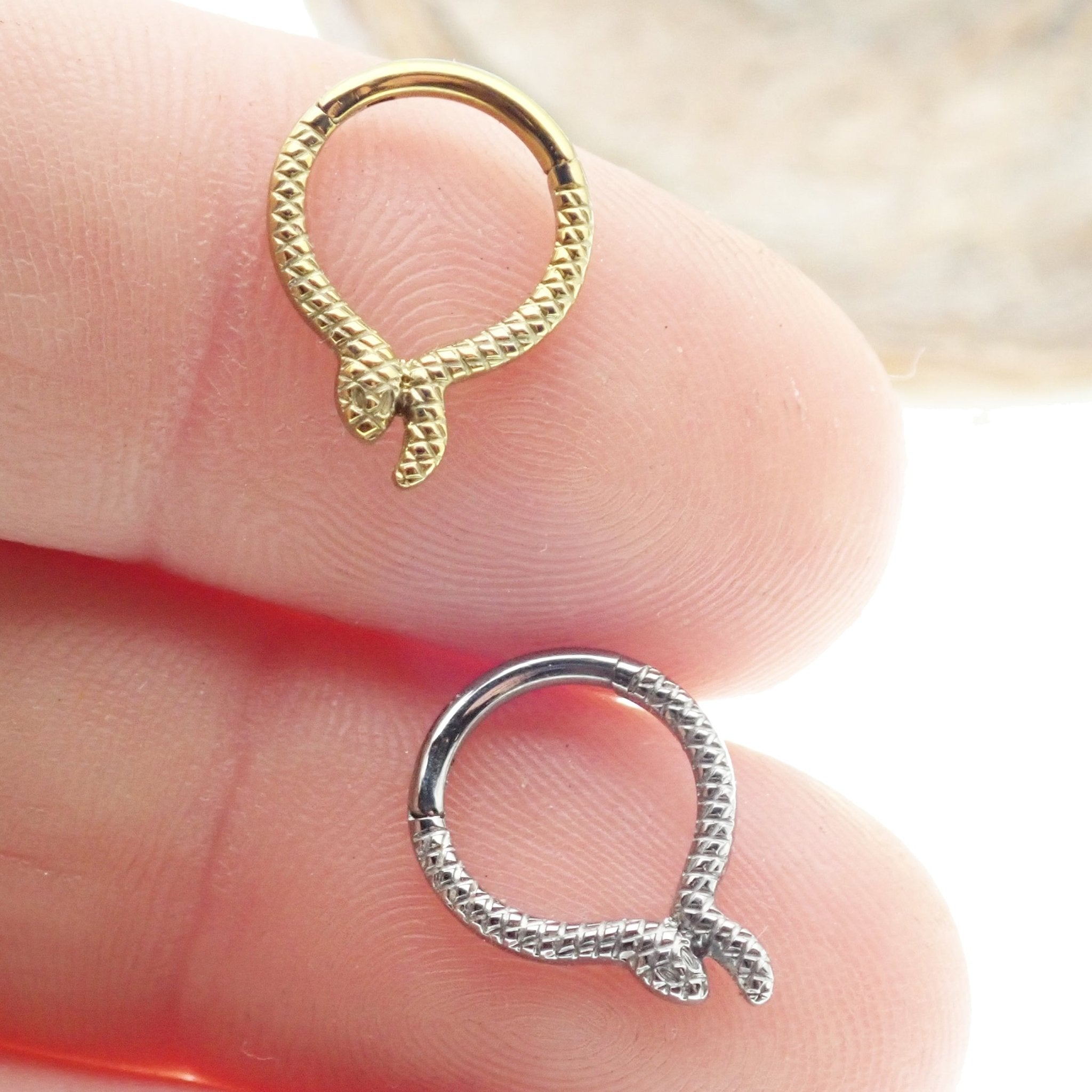 Snake titanium septum and daith clicker jewelry, 16g, 8mm, with a sleek snake design from Body Clickers Body Jewelry.