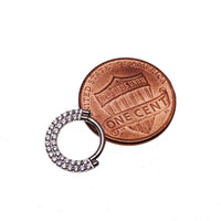 Steel double-row CZ inlaid clicker body jewelry in 16g with a sleek design and sparkling accents for a stylish look.