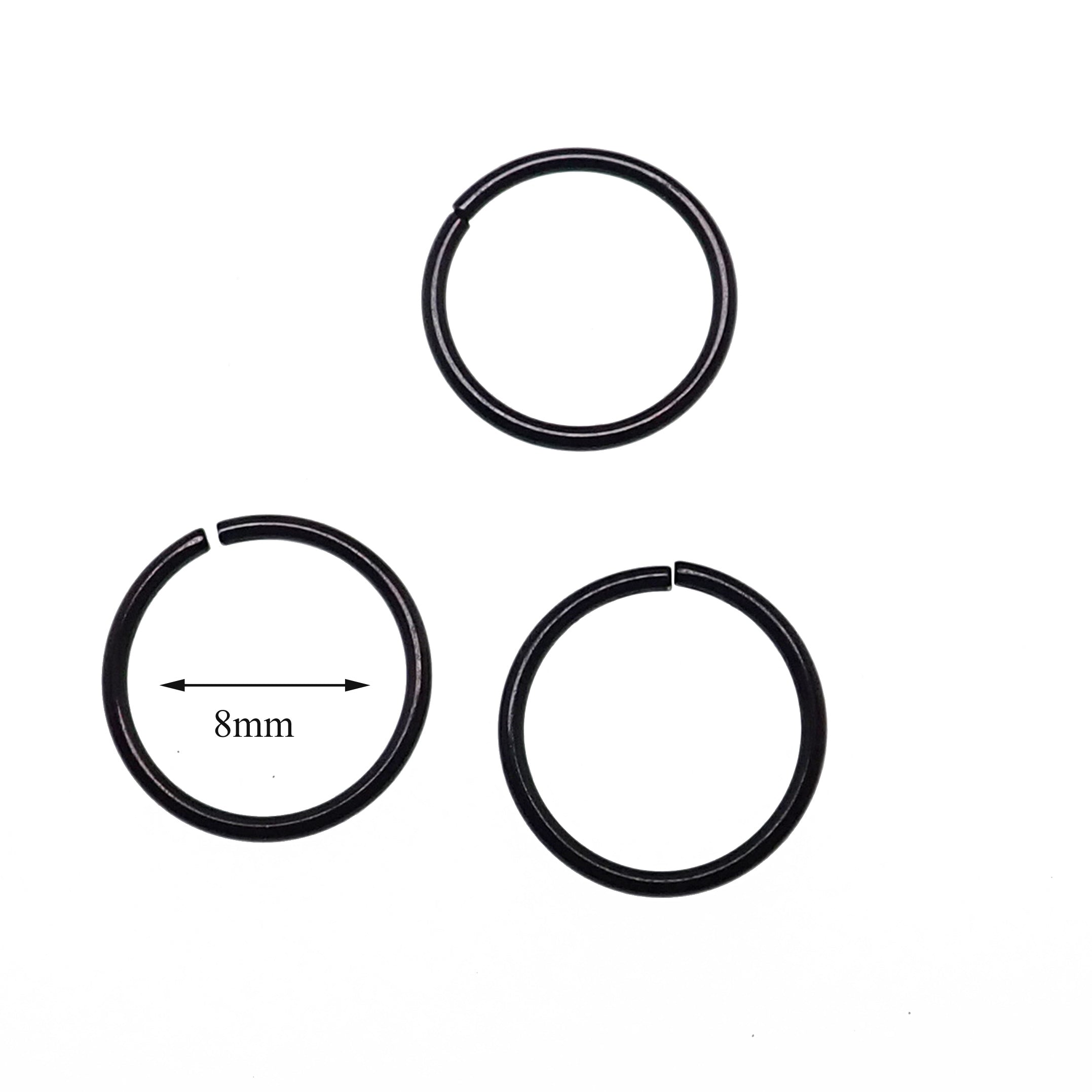 Set of three black steel seamless pull-apart rings for body jewelry, 20g, from Body Clickers, displayed on a white background.