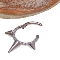 Body Clickers Tri-Spike and CZ Stone Clicker body jewelry in 16g, featuring a stylish spiked design with sparkling stones.