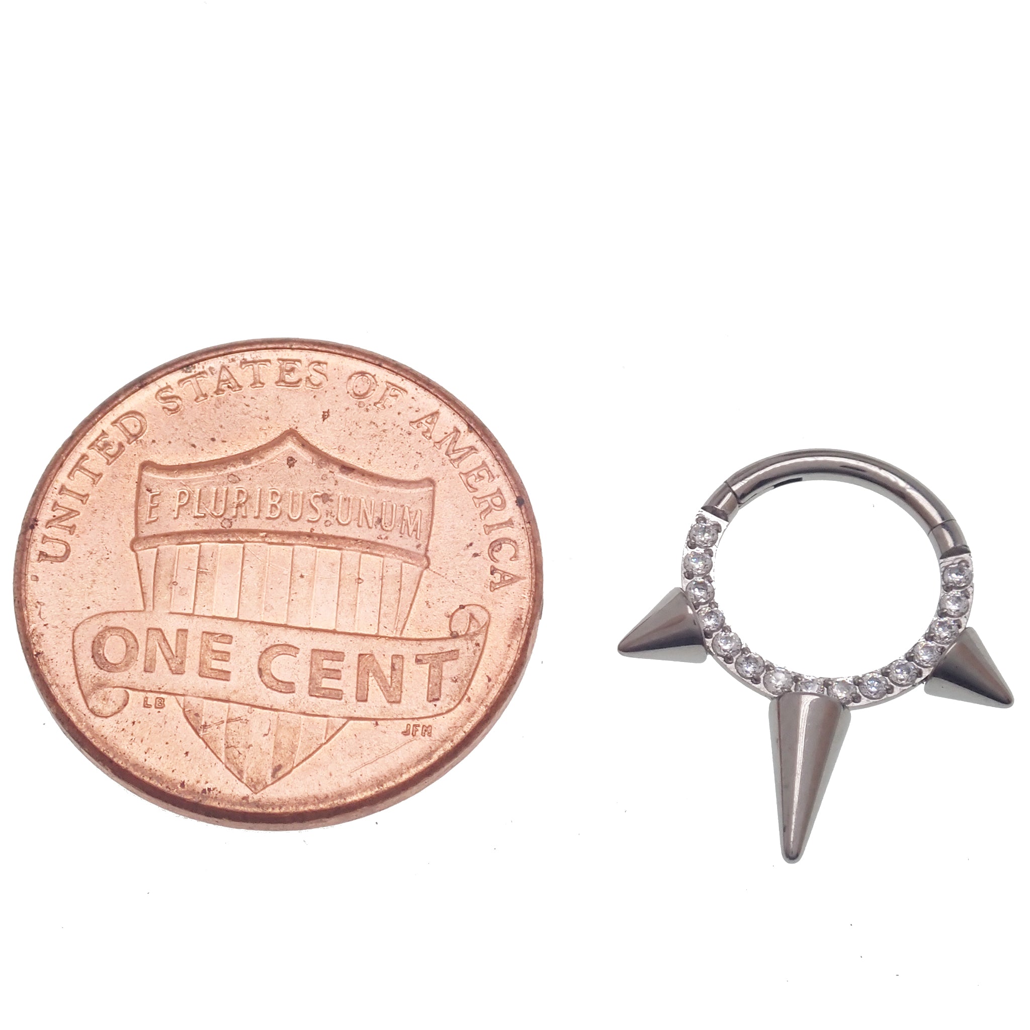 Tri-Spike and CZ stone clicker body jewelry in 16g by Body Clickers, featuring a stylish design with sparkling stones and spikes.