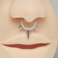 Tri-Spike and CZ stone body jewelry clicker in 16g, featuring a stylish design and sparkling accents by Body Clickers.