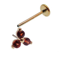 14K gold garnet threadless flat back labret piercing from Body Clickers Body Jewelry with a natural stone gemstone.