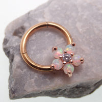 Gold flower opal clicker hoop with 8mm diameter and 16g body jewelry, featuring floral design and opal accents.