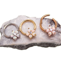 Gold Flower Opal Clicker Hoop 8mm 16g by Body Clickers Body Jewelry featuring a floral design and vibrant opal accents.
