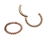 Gold and rose gold 14k gold twisted 8mm body jewelry clicker in 16g from Body Clickers, featuring a sleek twisted design.