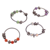 Green steel body jewelry ring with assorted attachments, 22g, by Body Clickers, featuring a sleek 8mm design.