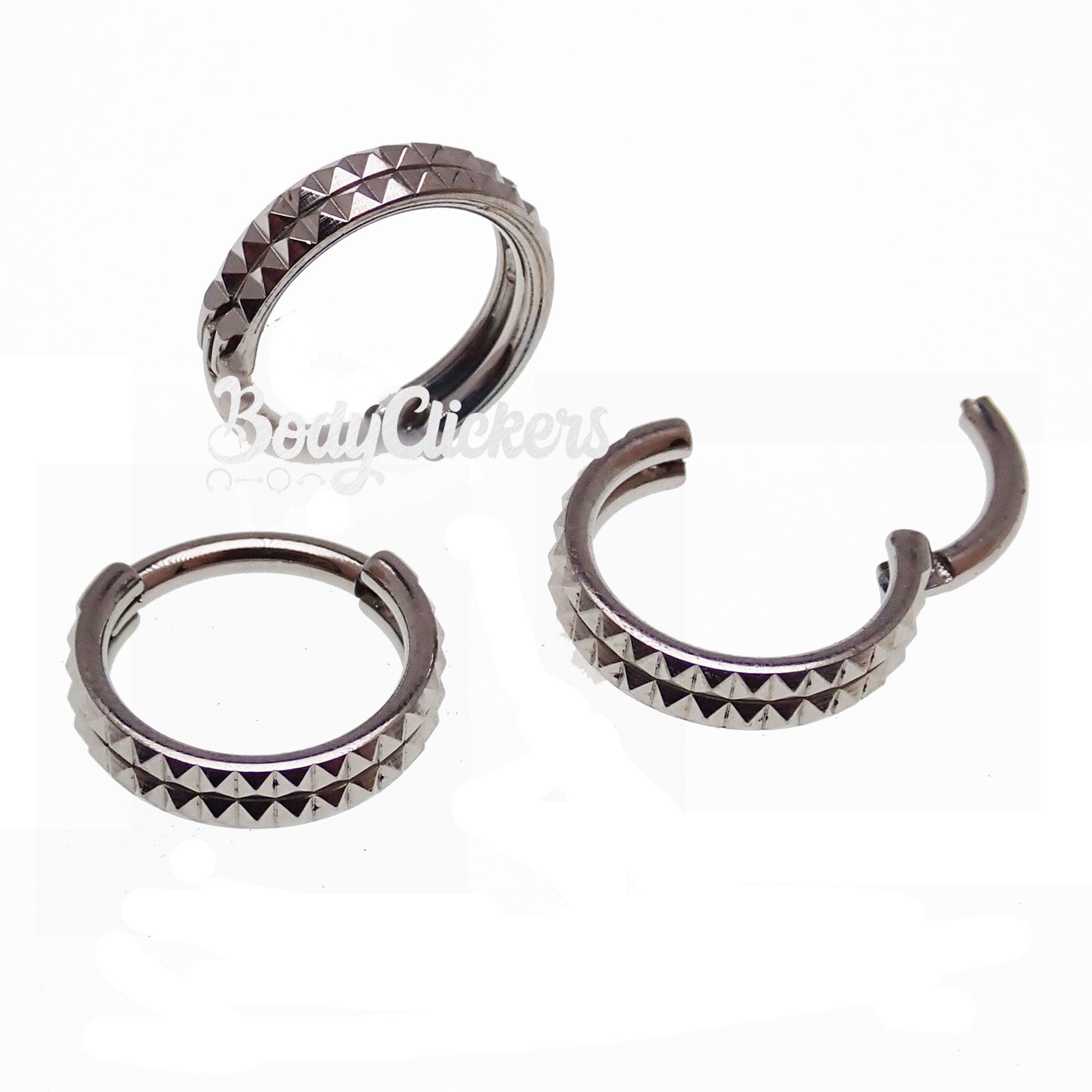 Engraved double row hinged clicker body jewelry in 16g with 8mm width, featuring detailed design and silver finish.