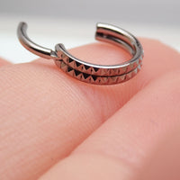 Engraved double row hinged clicker body jewelry in 16g with 8mm size, featuring intricate engraving and sleek design.