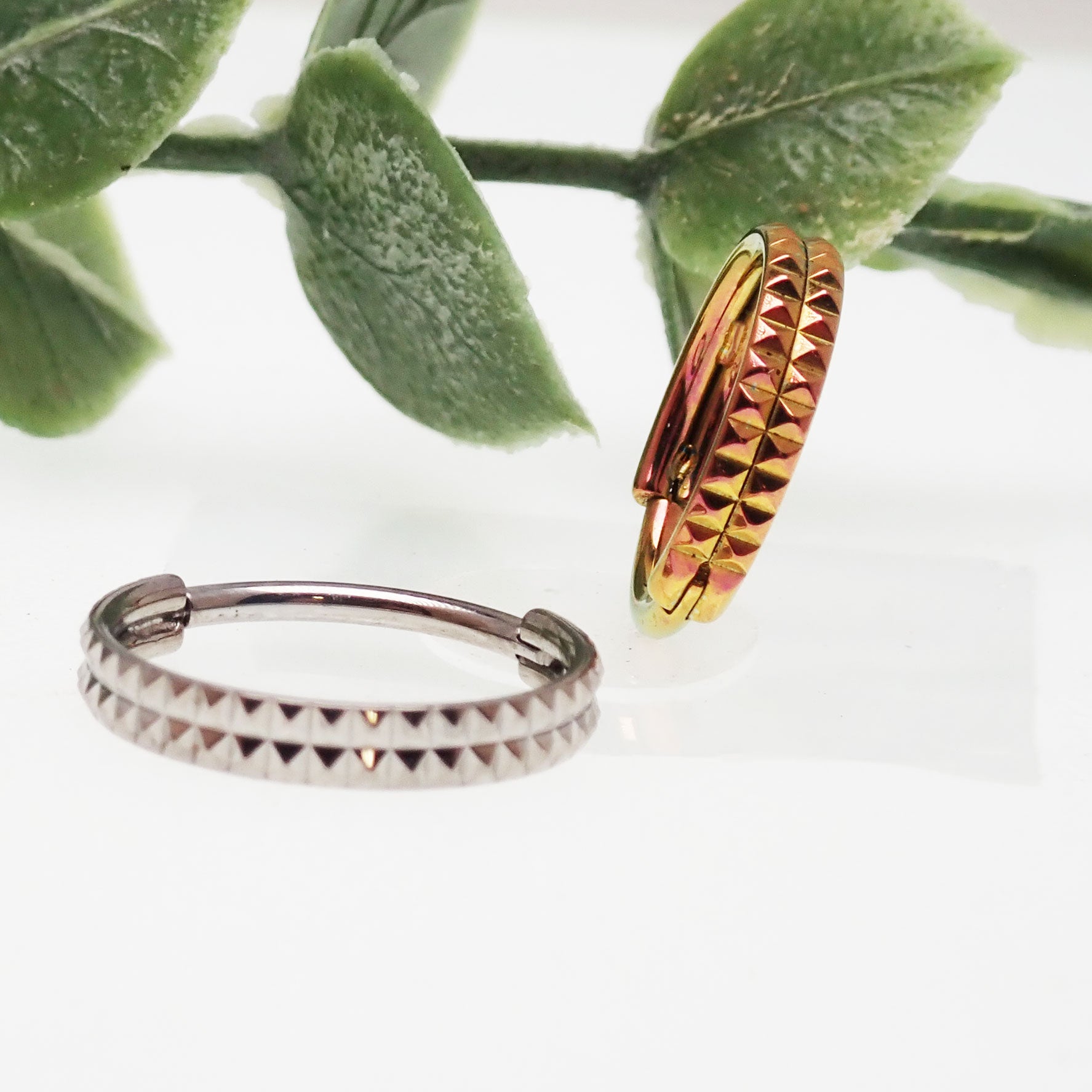 Engraved double row hinged clicker body jewelry in 16g with 8mm width, from Body Clickers.