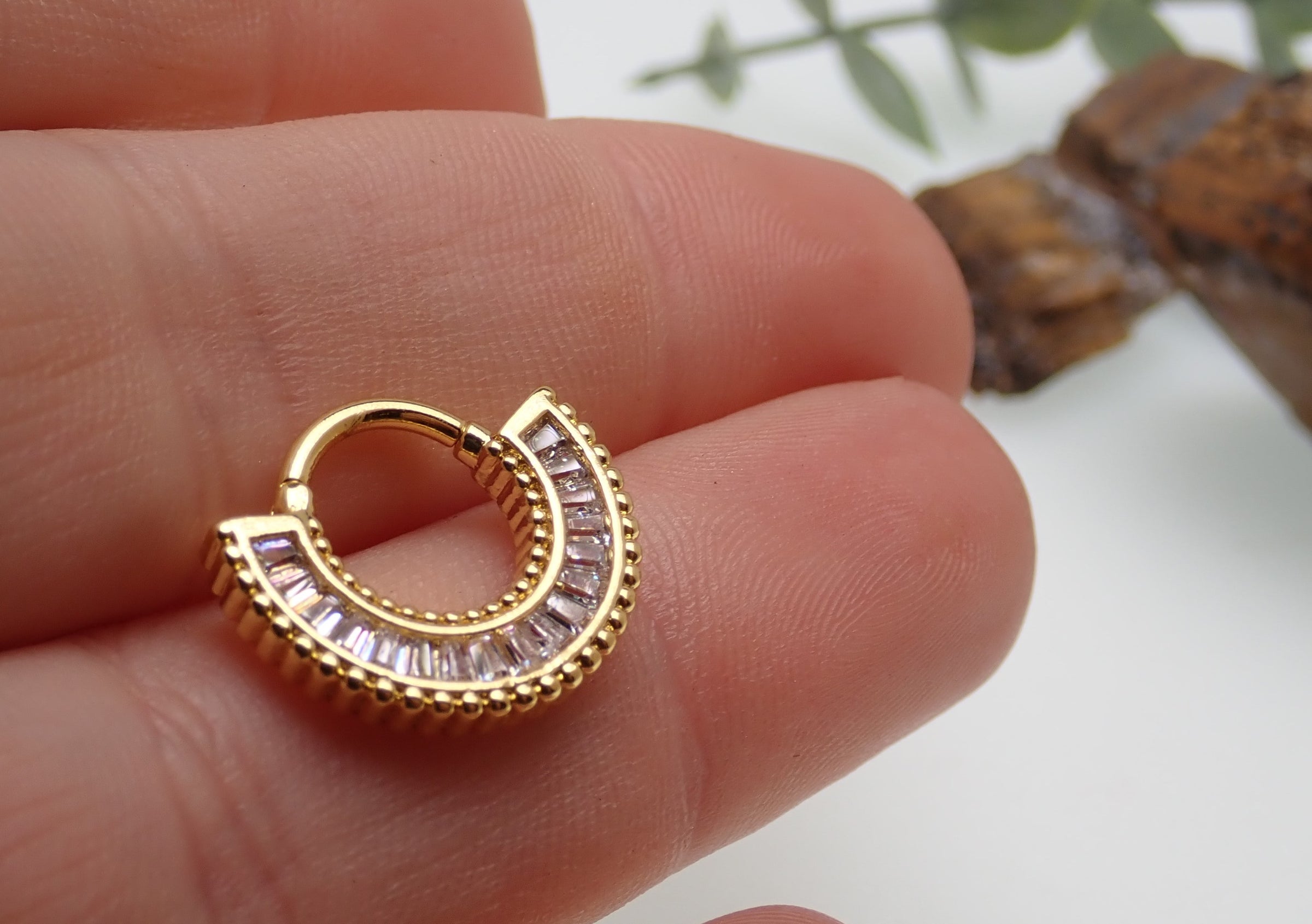 Hinged 16g Body Clickers Body Jewelry daith and septum clicker with sparkling CZ stones, featuring a sleek curved design