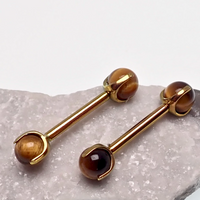Tiger's Eye industrial piercing by Body Clickers Body Jewelry, 14g, 25mm length, showcasing the unique gemstone design.