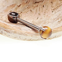 Tiger's Eye industrial piercing in 14g by Body Clickers Body Jewelry, featuring a 25mm gemstone and sleek industrial design.