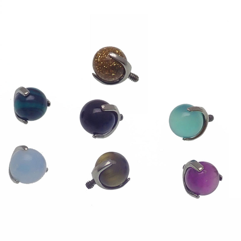 Natural jade stone body jewelry with 14g titanium base and spherical balls, designed by Body Clickers for body piercing.