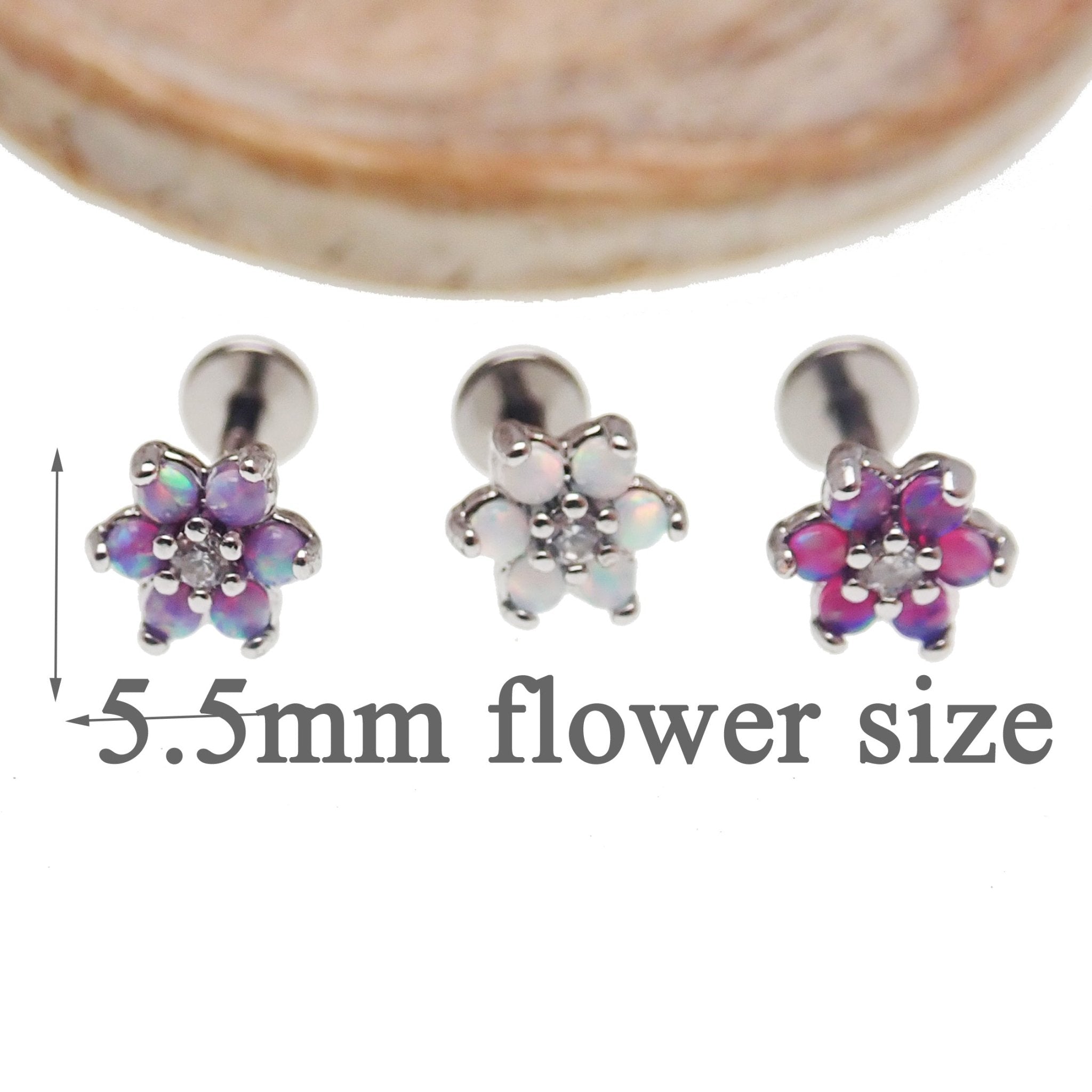 Lavender surgical steel push fit body jewelry with opal flower design by Body Clickers, 6mm size.