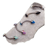 Yellow opal spike and cabochon curved barbell body jewelry from Body Clickers, 16g, featuring moon-shaped design and vibrant gemstone.