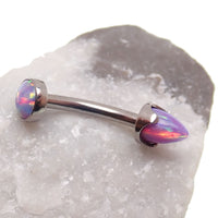 Yellow moon opal spike and cabochon curved barbell body jewelry in 16g by Body Clickers with 6mm stones