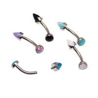Yellow opal spike and cabochon curved barbell body jewelry in 16g with moon design by Body Clickers.