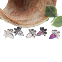 Lotus flower opal push fit labret body jewelry in various gauges by Body Clickers, featuring a 6mm opal lotus flower design.
