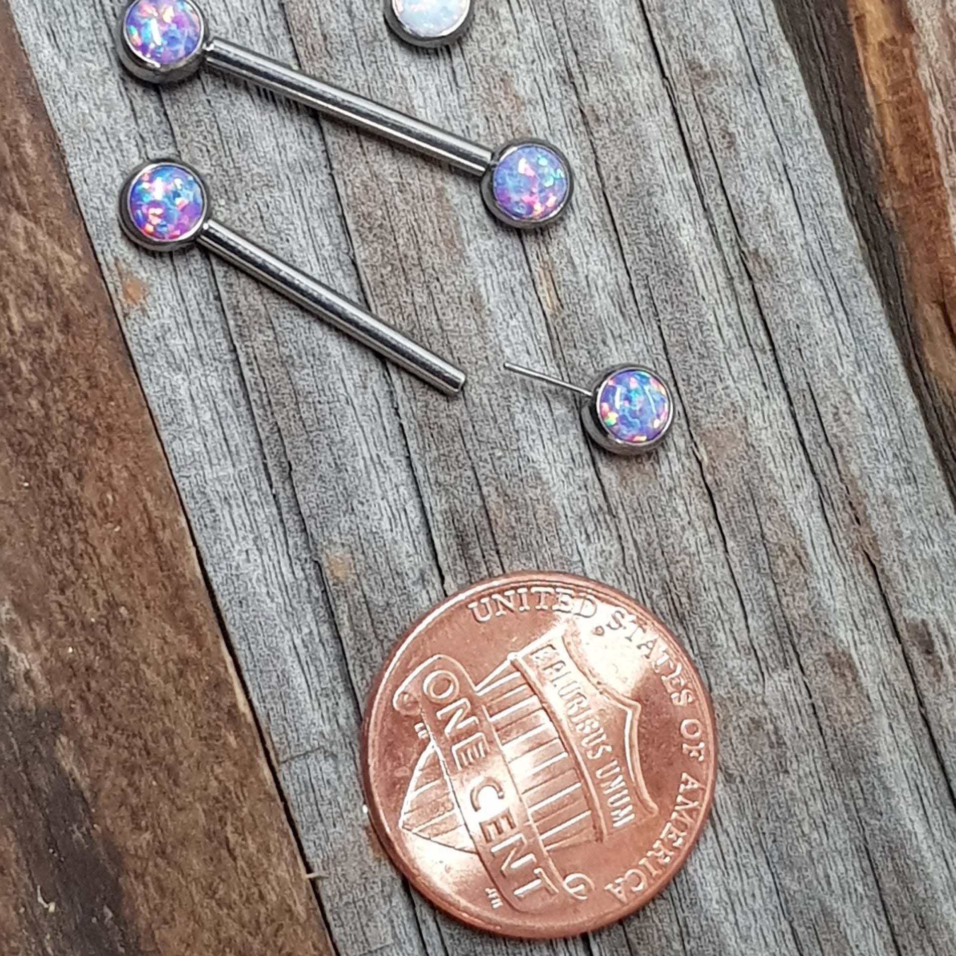 Peacock blue Opal push-fit nipple bars by Body Clickers, 14g and 16g body jewelry with 12mm length for piercing adornment