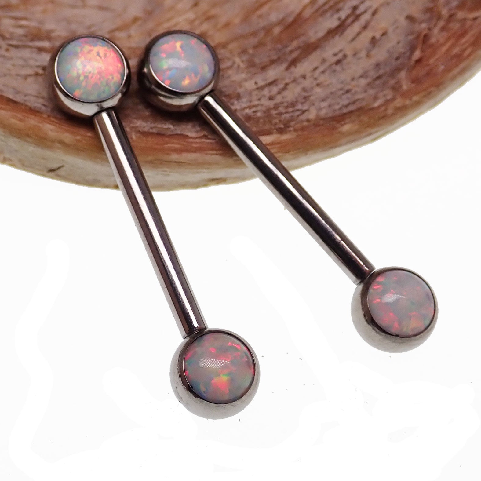 Peacock blue opal push fit nipple bars by Body Clickers in 14g and 16g body jewelry with 12mm length.