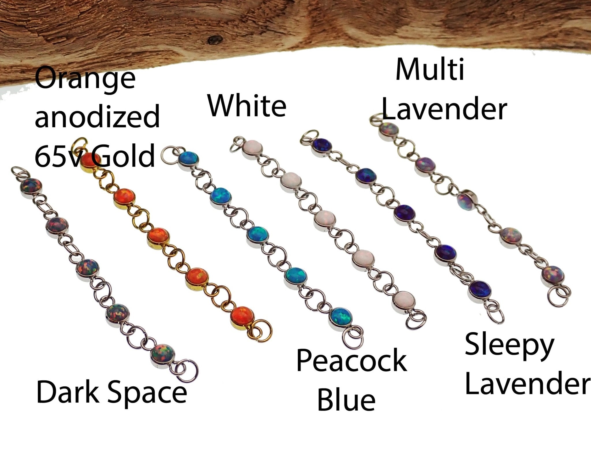 Titanium opal piercing add-on chain for body jewelry by Body Clickers, featuring peacock blue opal and sleek design.