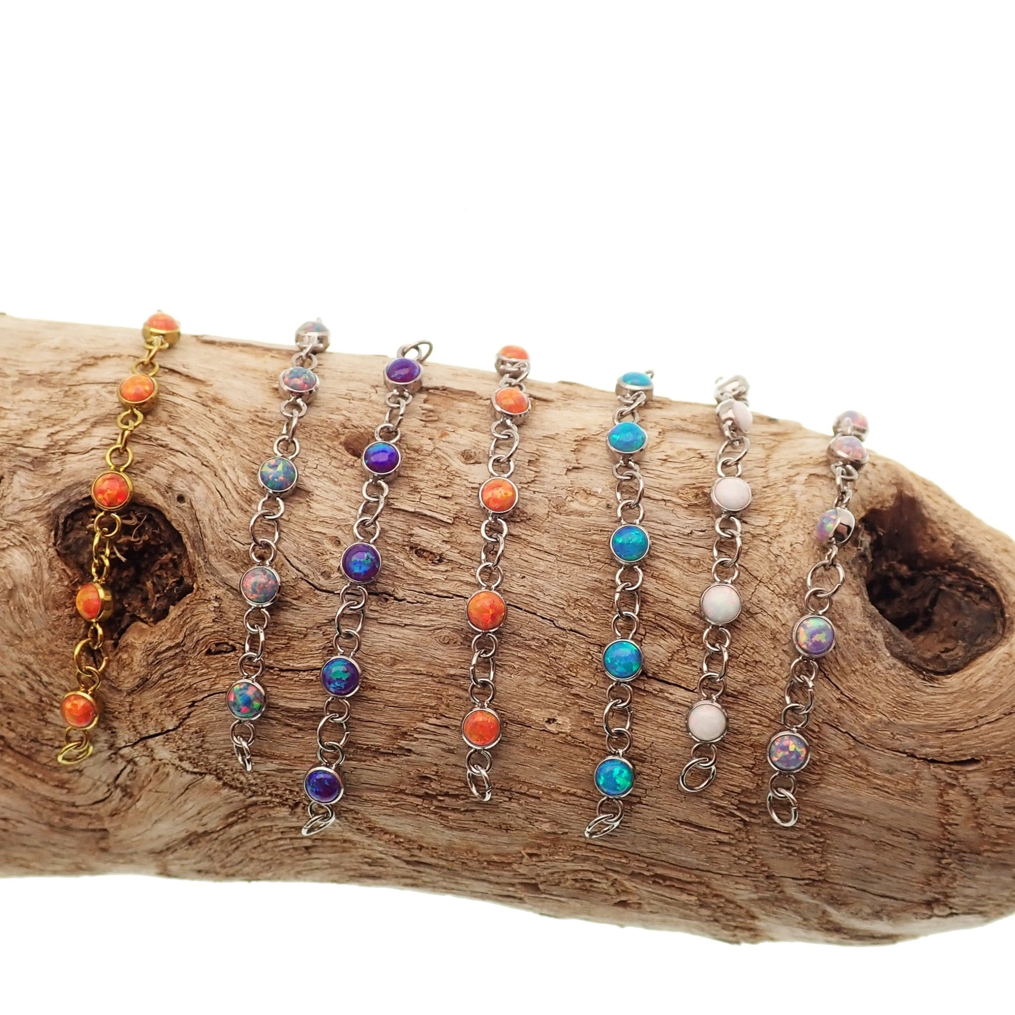 Peacock blue titanium opal piercing add-on chain for body jewelry by Body Clickers, featuring a sleek titanium design.