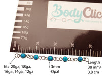 Peacock blue titanium opal body jewelry add-on chain by Body Clickers, designed for piercing enhancements.