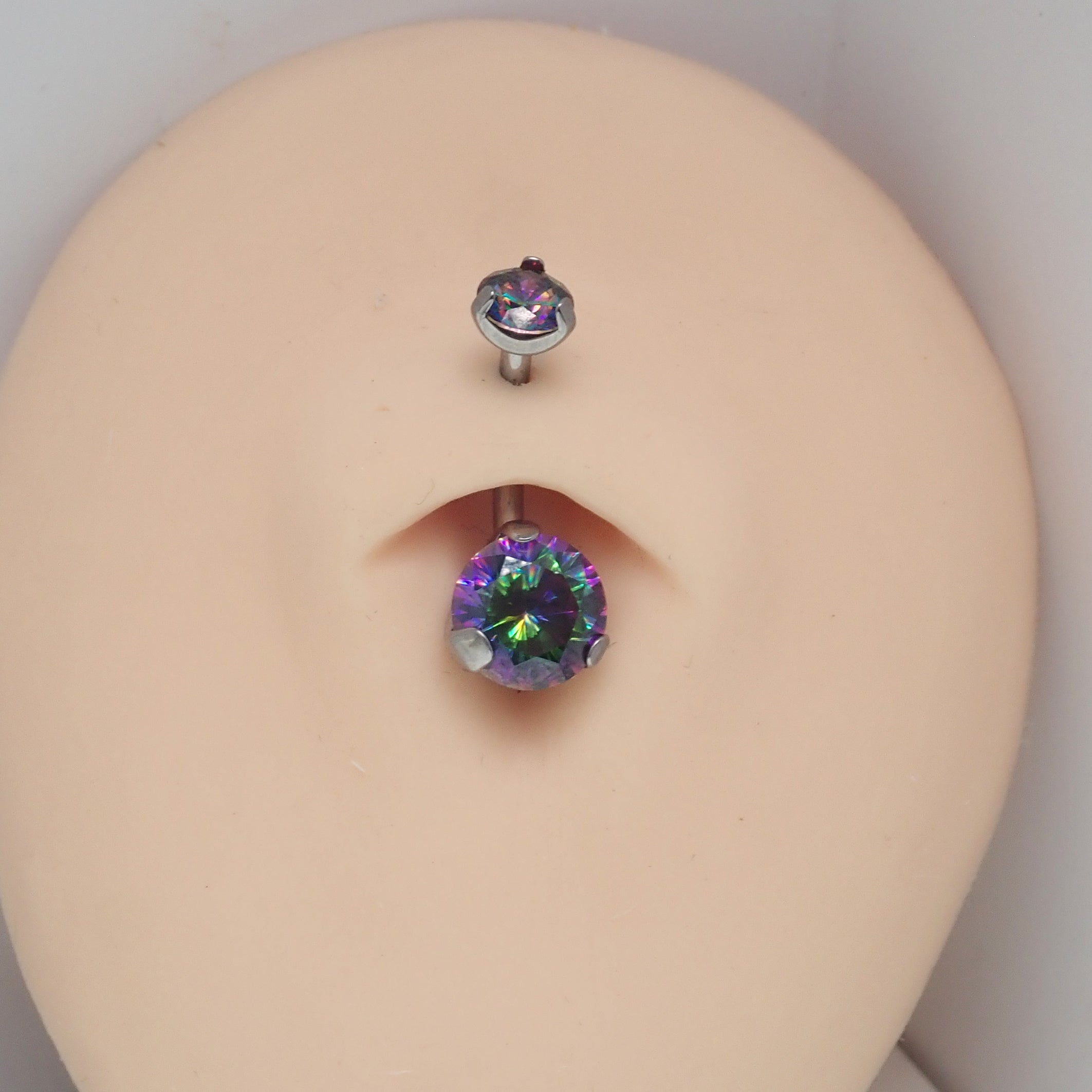 Body Clickers VM Regular/Mini Belly Bar 14g body jewelry with curved bar and decorative ends for navel piercing.
