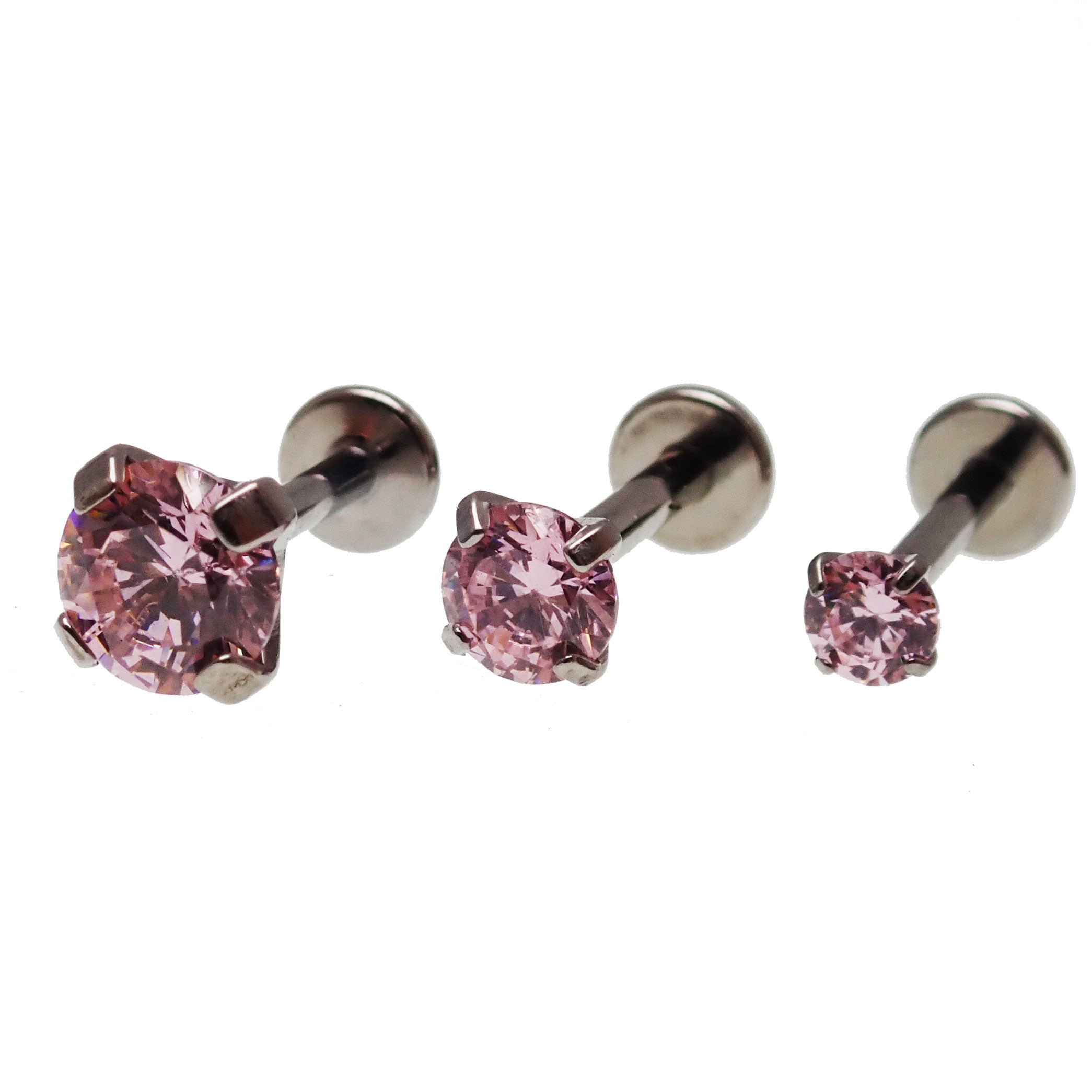 Set of three Body Clickers pink triple CZ flat back body jewelry in 14g, 16g, and 18g sizes, showcasing sparkling gemstone accents.