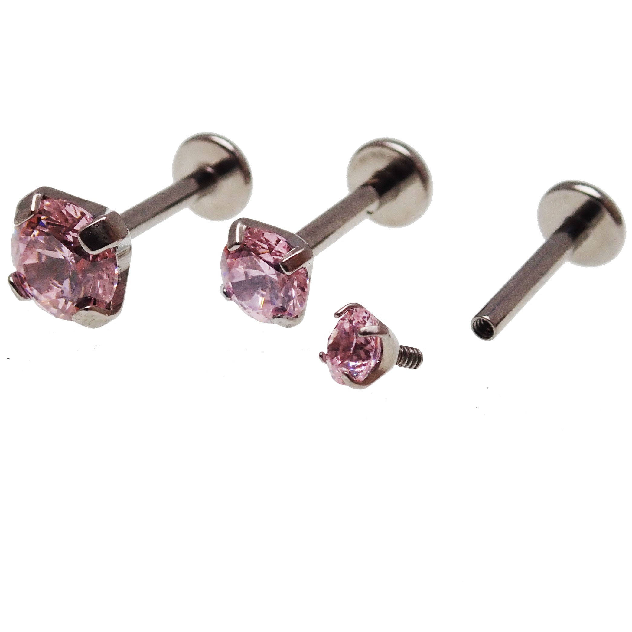 Pink triple CZ flat back body jewelry set from Body Clickers in 14g, 16g, and 18g with 6mm stones on a white background.