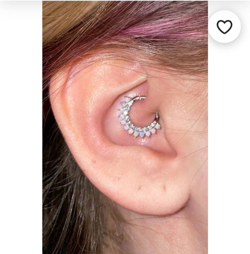 Silver CZ opal steel clicker body jewelry in 16g with 8mm or 10mm diameter, featuring a sleek, modern design.