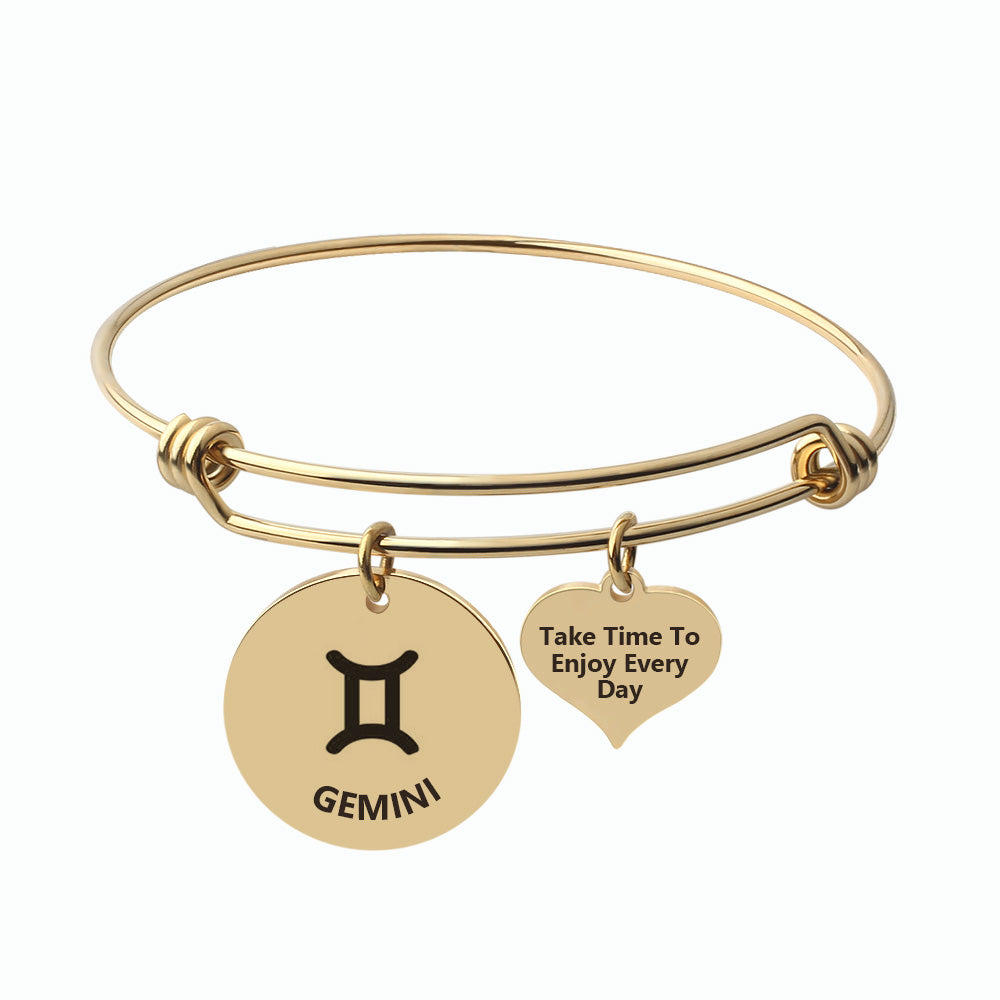Silver Capricorn steel zodiac bangle by Body Clickers Body Jewelry, featuring a sleek design with Capricorn zodiac symbol.
