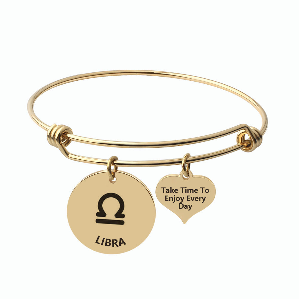 Silver Steel Capricorn Zodiac Bangle by Body Clickers Body Jewelry, featuring a sleek design with Capricorn symbol.
