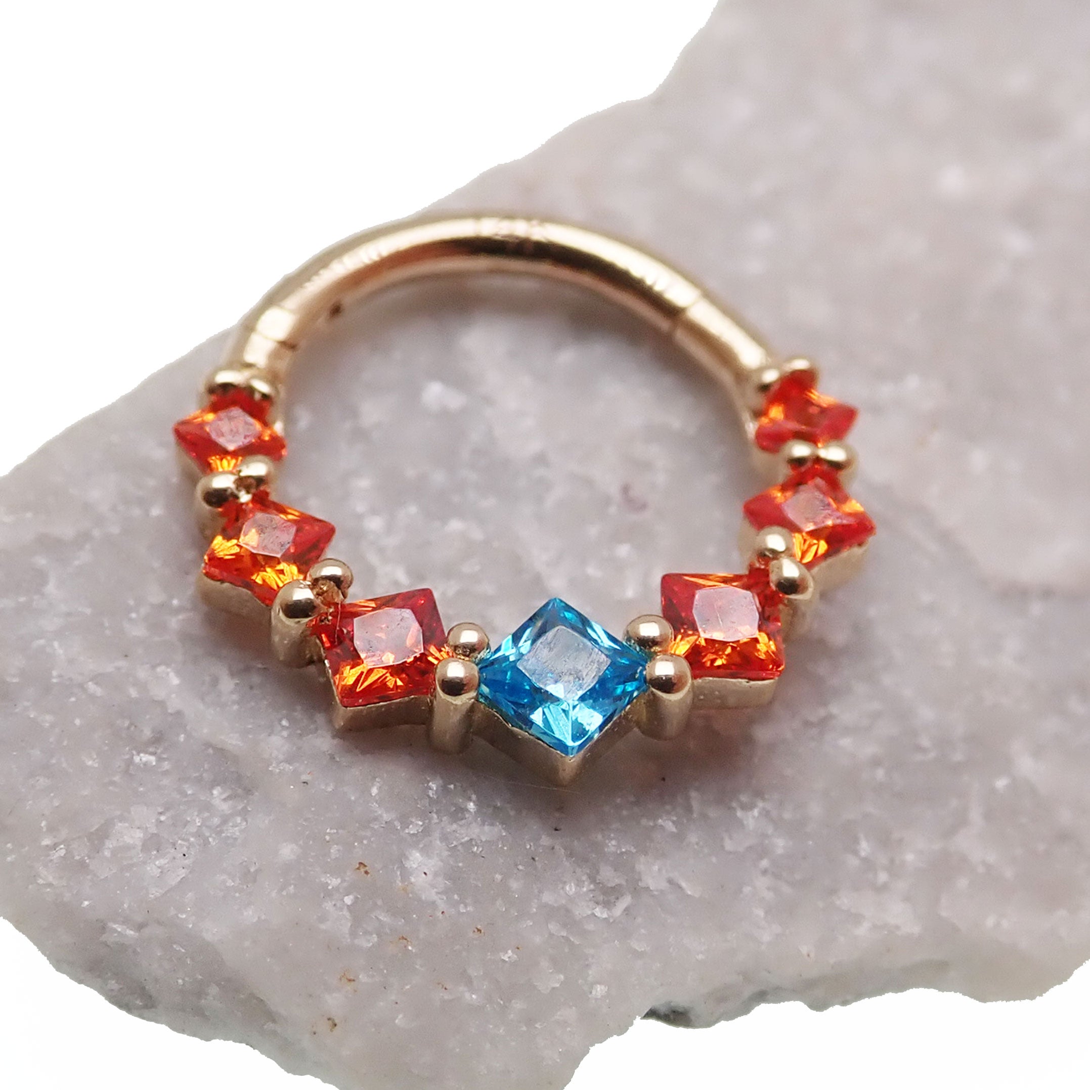 Teal and orange hinged body clicker jewelry with 14k gold and CZ stones, designed for body piercing, 16g.