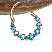 Hinged clicker body jewelry with 14k gold and CZ stones, teal and orange design, 16g size, by Body Clickers.
