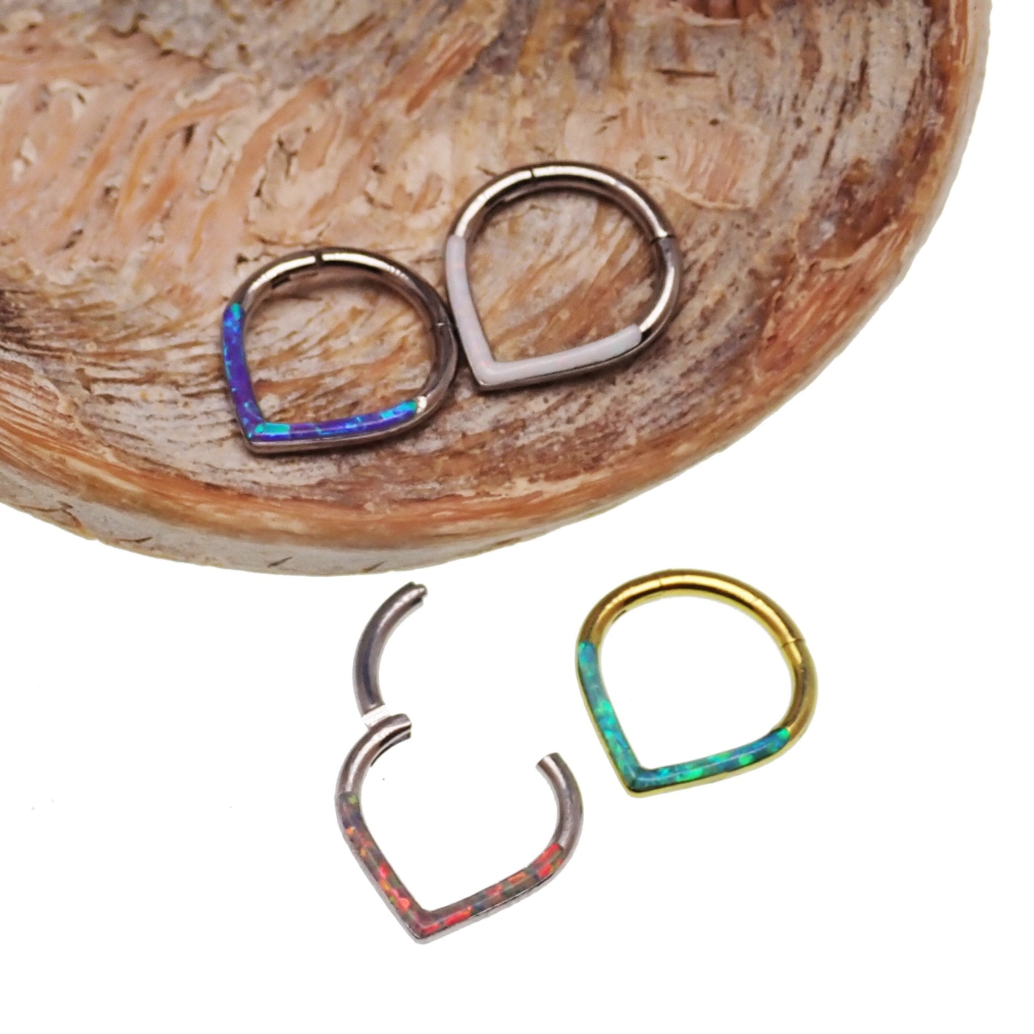 Opal titanium heart clicker body jewelry in 16g with 8mm white opal and heart-shaped design from Body Clickers