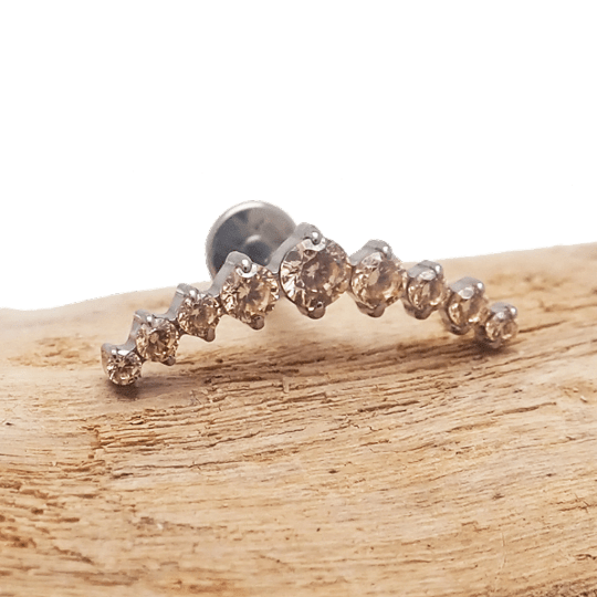 Clear and champagne CZ long crown titanium flatback piercing in 14g, 16g, 18g with detailed gemstone settings and sleek design.
