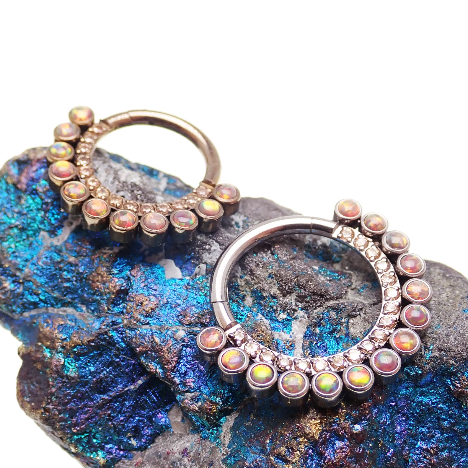 Dark cherry double row 16g clicker jewelry from Body Clickers, showing a sleek, polished metal design with double rows of stones.