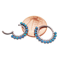Double row peacock blue opal and clear CZ stones body clicker earring with 16g gauge, from Body Clickers.