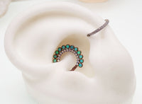 Kiwi green opals and rainbow CZ double row clicker body jewelry, 16g, by Body Clickers, featuring sparkling gemstones and a sleek design.