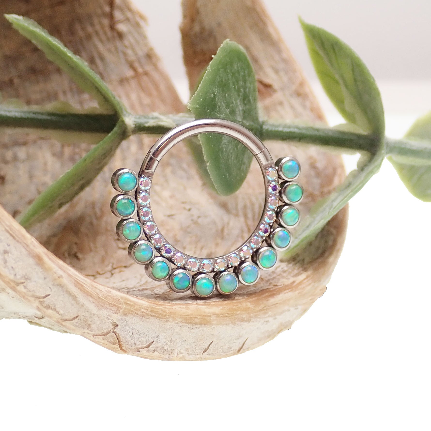 Double row Kiwi Green Opals and Rainbow CZ clicker earring in 16g from Body Clickers, showing the detailed design and vibrant colors.